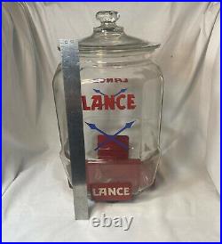 EXTREMELY RARE 1930'S 12 LANCE JAR With RED METAL STAND AND OVER LIP GLASS LID