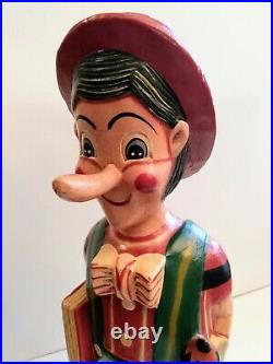Extremely rare, whimsical 1950's wood, hand-carved Pinocchio store display statue