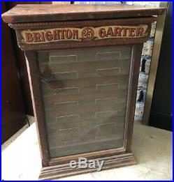 Rare Country Store Antique Brighton Silk Garter Wooden Display Cabinet